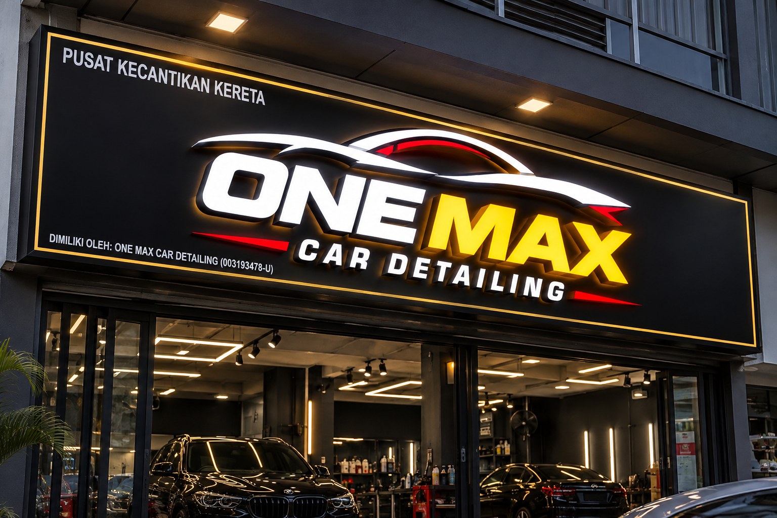 One Max Car Detailing illuminated sign mocked up above the workshop